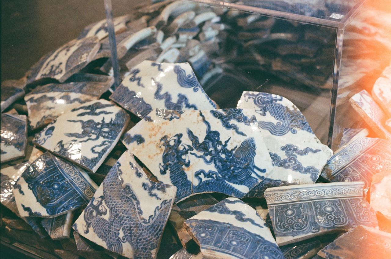 Blue-and-white porcelain fragments with dragon decoration on display