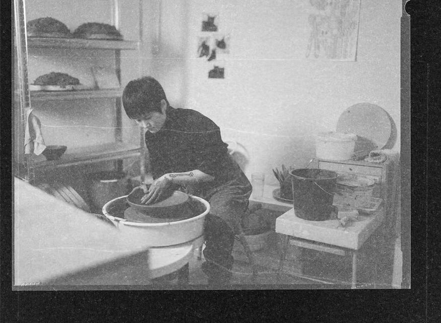 Saeam Kwon working at the pottery wheel