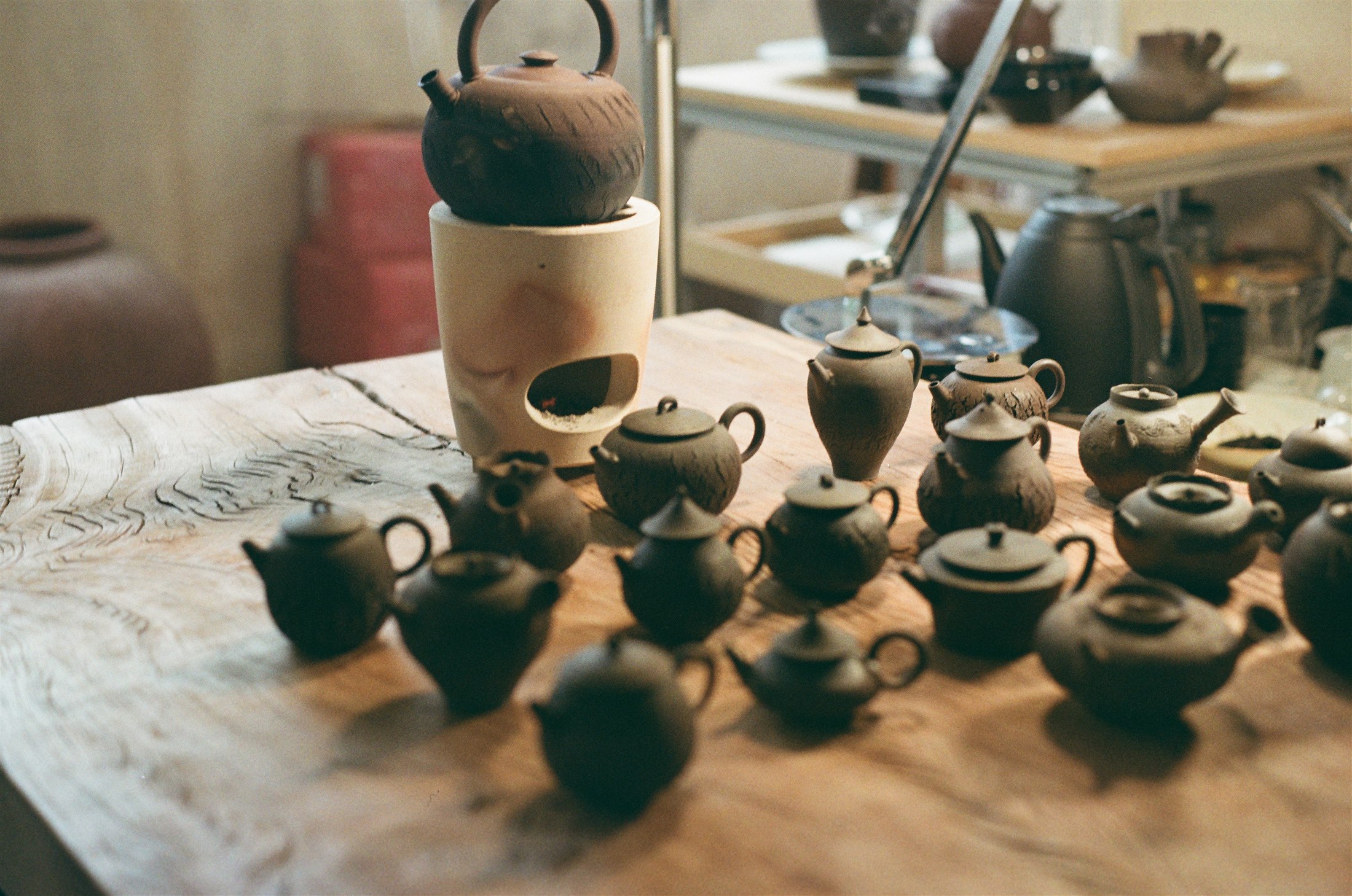 Clay kettle and handmade teapots in the studio